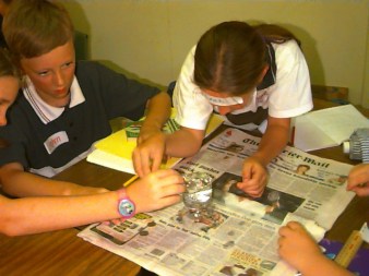 slipping pennies into water