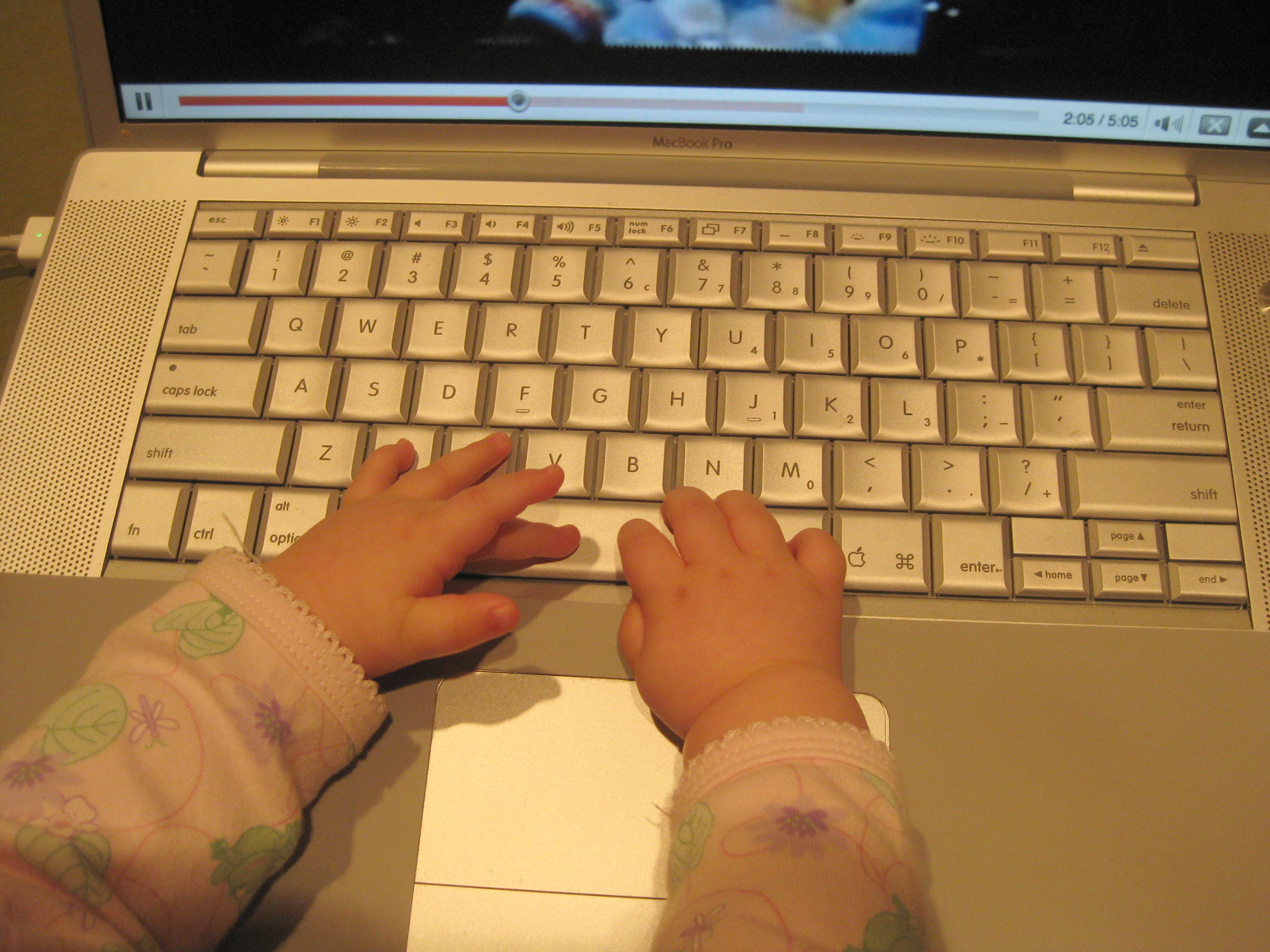 Chloe's fingers on the Mac keyboard