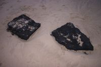 Asphalt chunks from former parking area