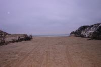 Newly scoured beach; missing dune